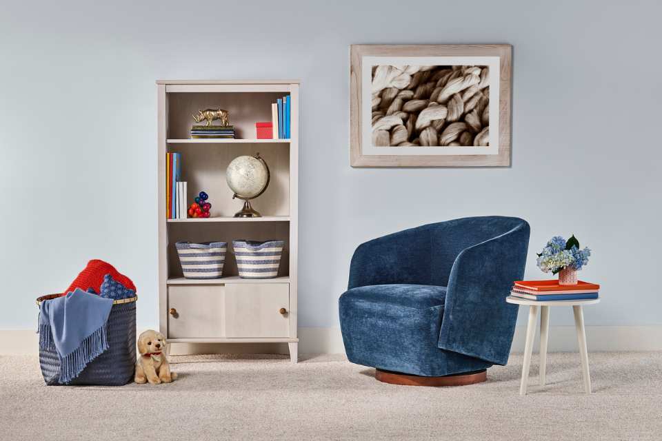 plush grey carpet in blue kids room with velvet armchair